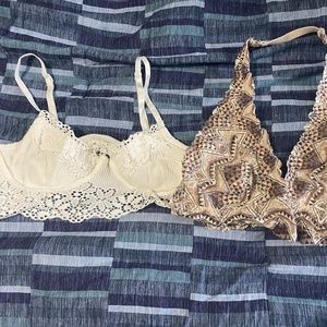 Two bralettes, never worn, one is small Garage and one is medium PINK.
